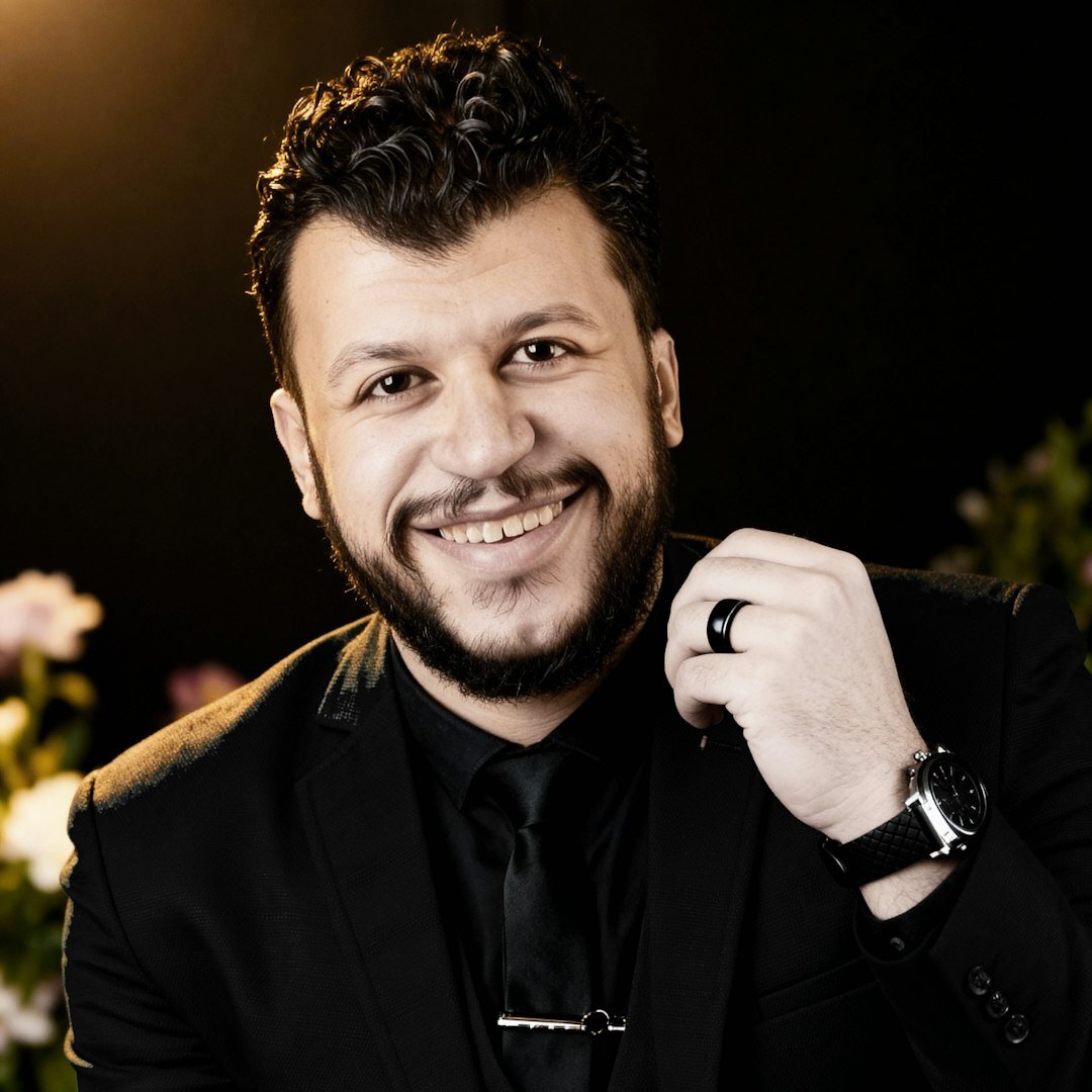 Professional Turkish male media instructor with glasses in studio
