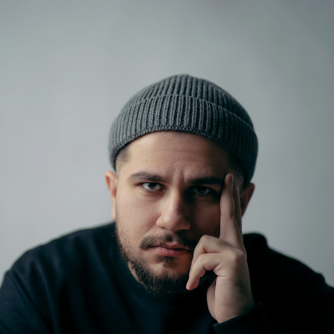 Young Turkish male video production instructor with short beard